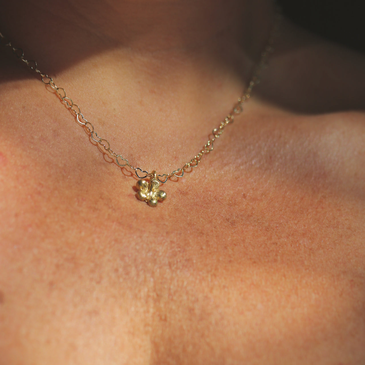 Things We Love Gold Heart Chain and Hibiscus Charm