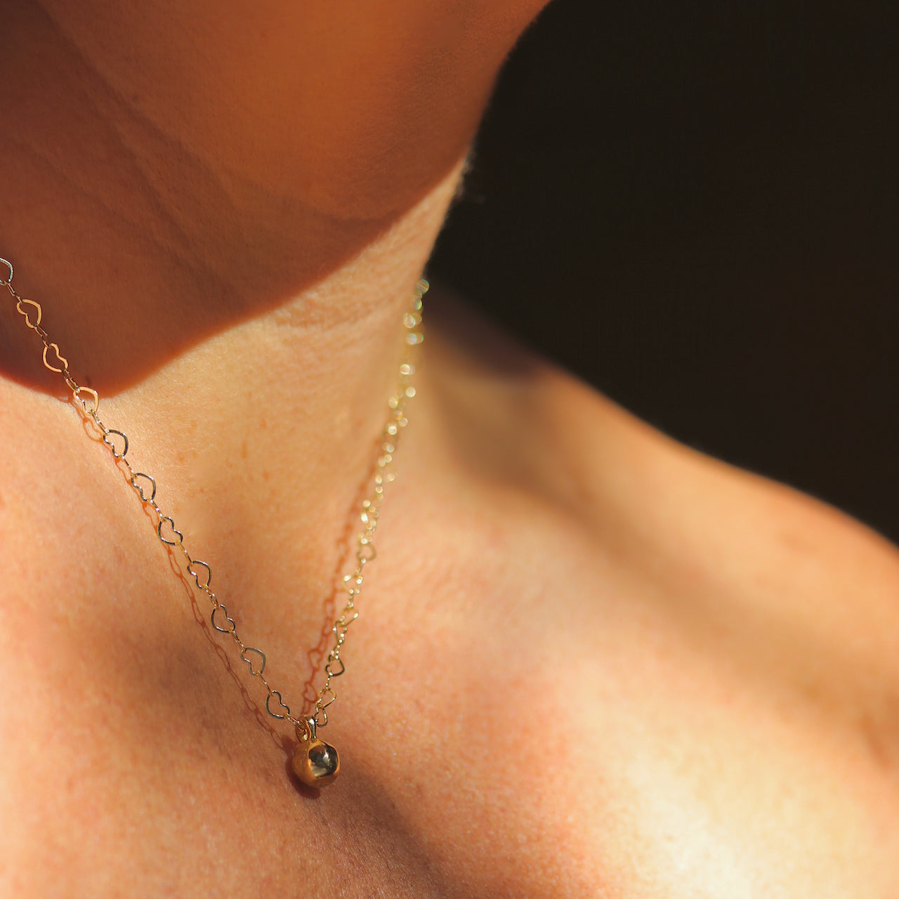 Things We Love Gold Heart Chain and Kettlebell Charm