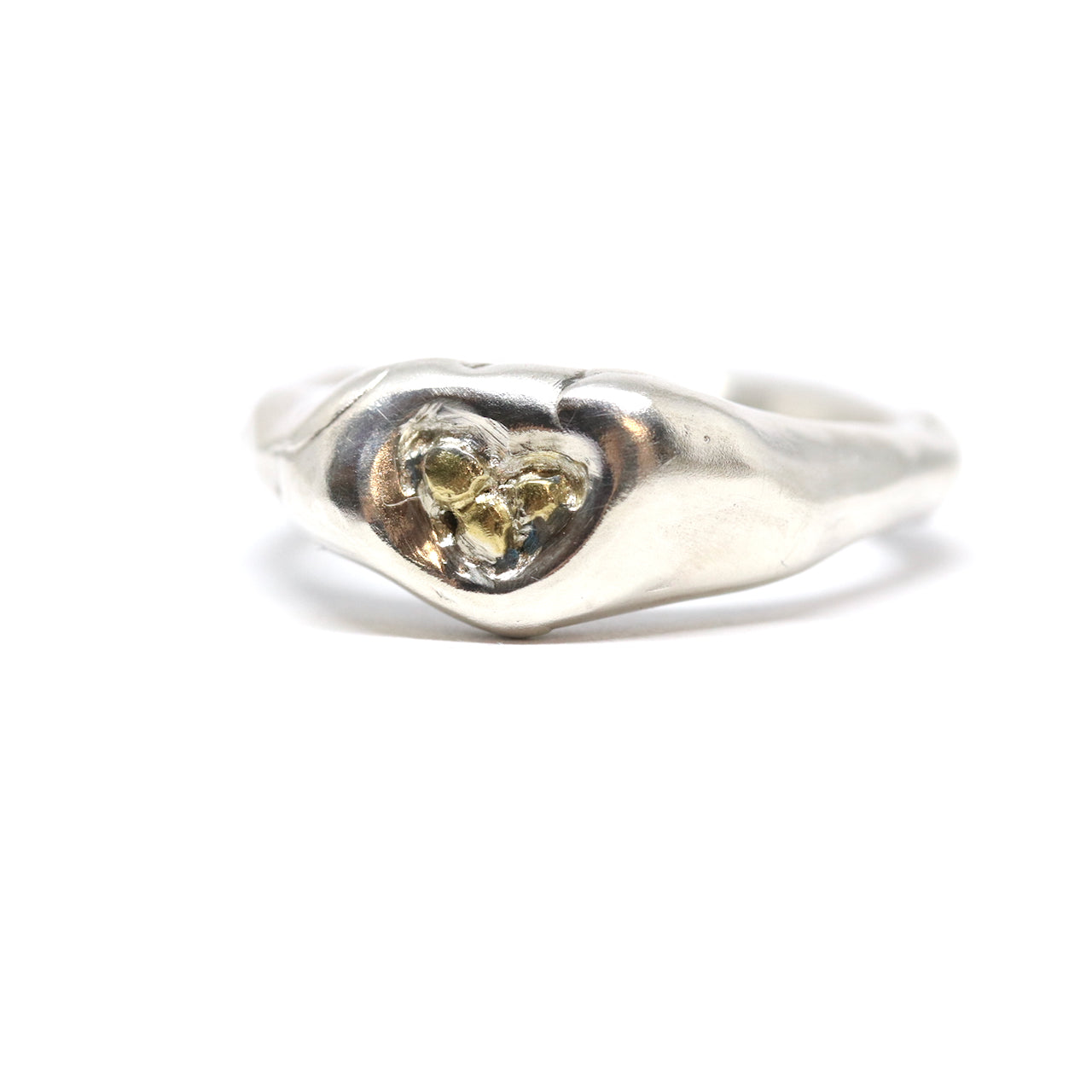 A sterling silver ring with 24k gold. This ring was hand made in Wānaka, New Zealand by designer and jeweller Briar Hardy-Hesson.