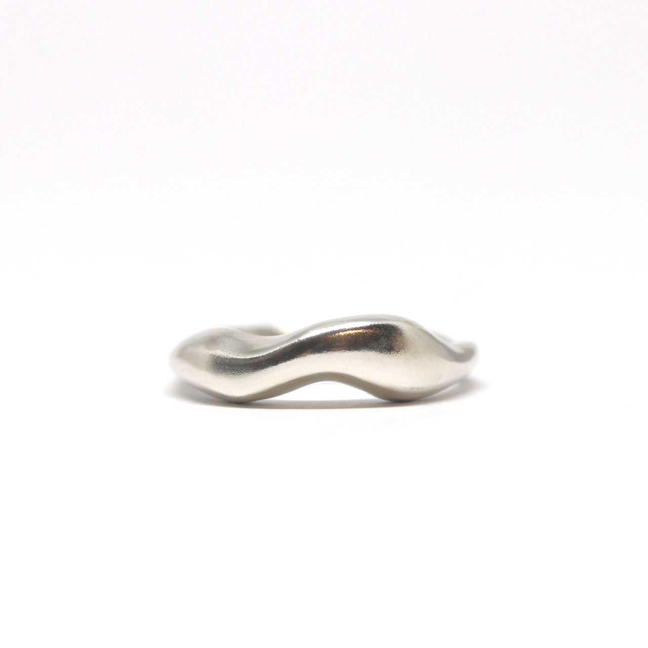 A wavy, mountain sterling silver ring. This ring was hand made in Wānaka, New Zealand by designer and jeweller Briar Hardy-Hesson.