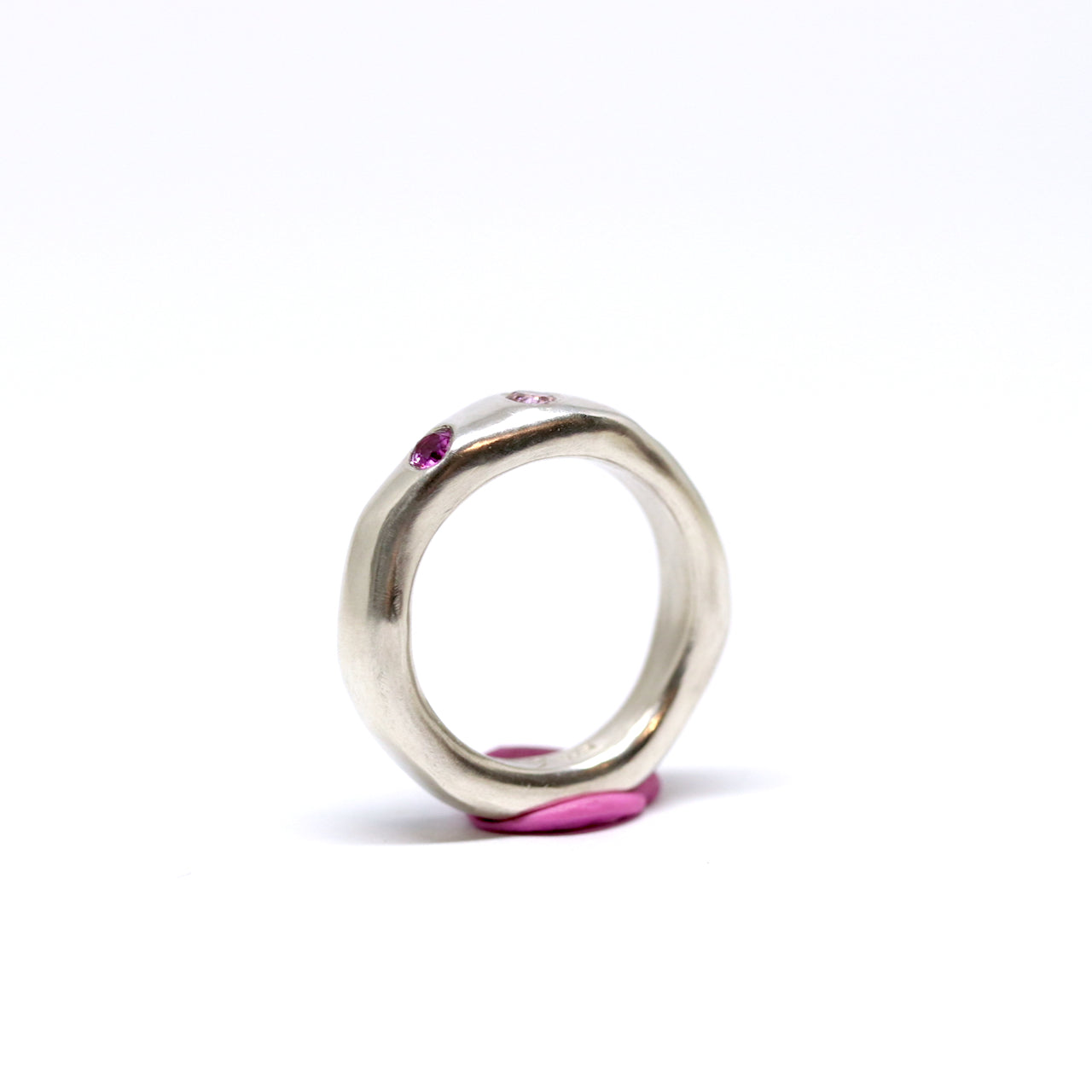 A sterling silver ring, just a tad chunky with citrine, pink and ruby pink cubic zirconia.