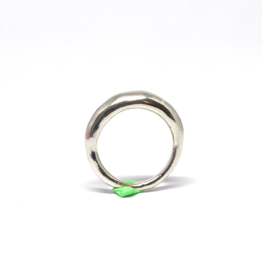 A crescent moon shaped sterling silver ring.