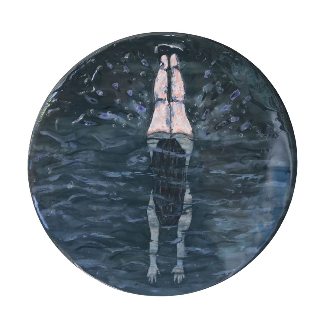 Round painting of woman diving below water surface with legs in the air