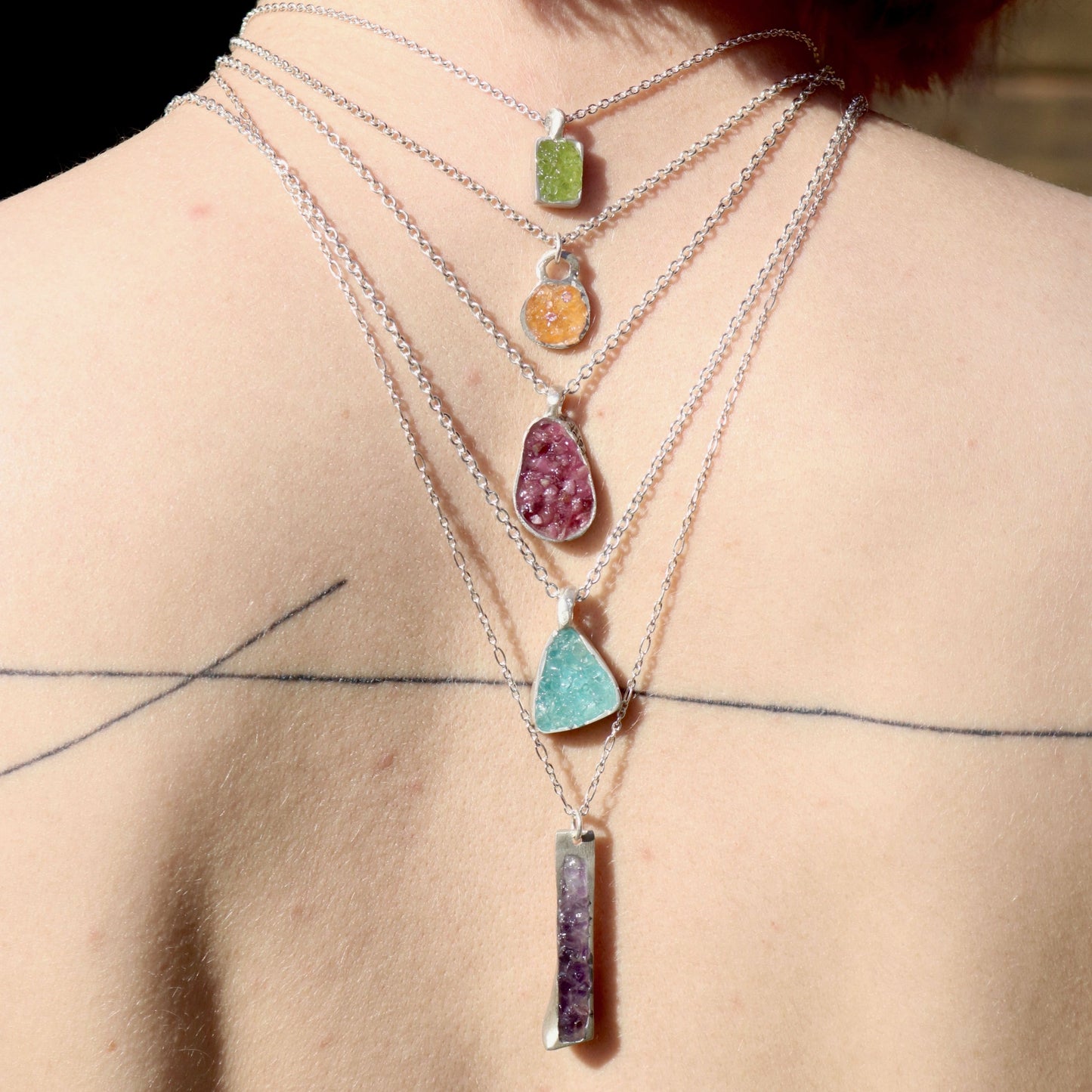 Gemstone pendants. Made in Wanaka. Unique, colourful jewellery designed and crafted by New Zealand artist and jeweller Briar Hardy-Hesson.