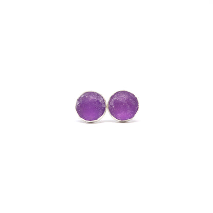 Purple stud earrings. Hand made jewellery by Wānaka artist and jeweller Briar Hardy-Hesson.